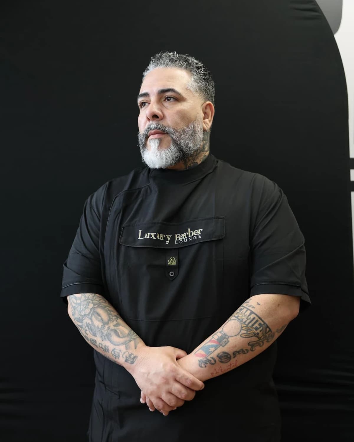 Rubén Diaz, Jr., owner and master barber at Luxury Barber Lounge